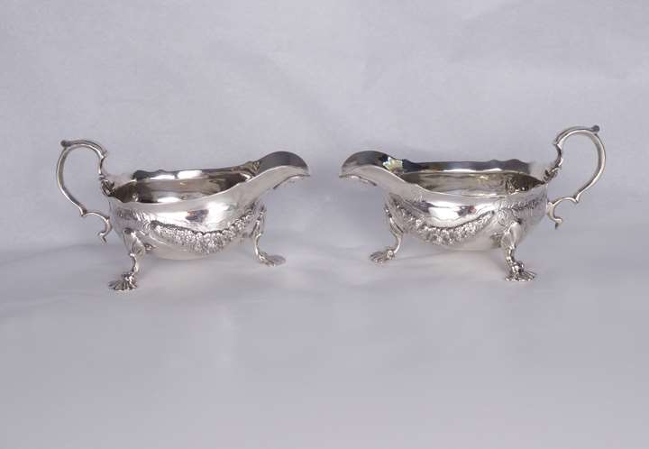 Pair of George II silver oval sauceboats by George Wickes